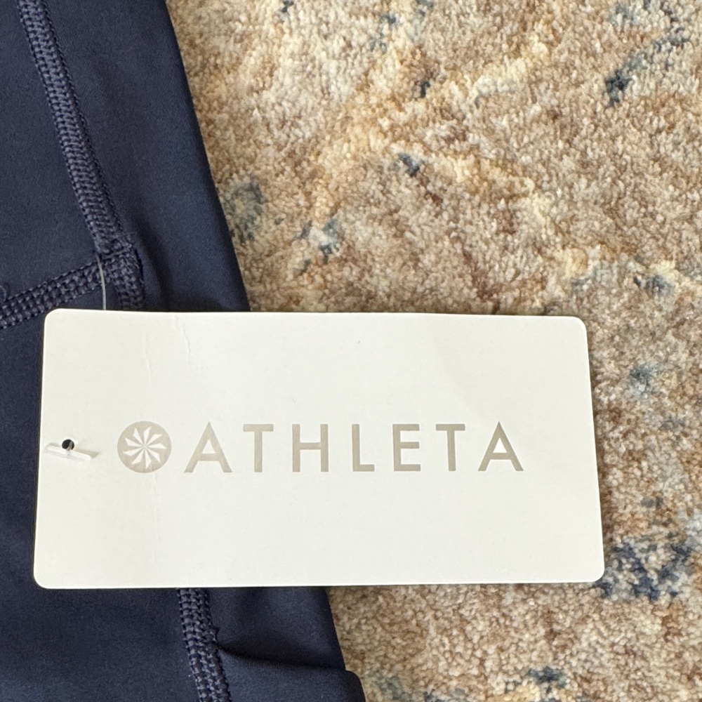 Athleta ultimate stash 7” pocket Navy High-Waisted Shorts - Picture 2 of 9